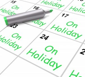 On Holiday Calendar Shows Annual Leave Or Time Off” by Stuart Miles